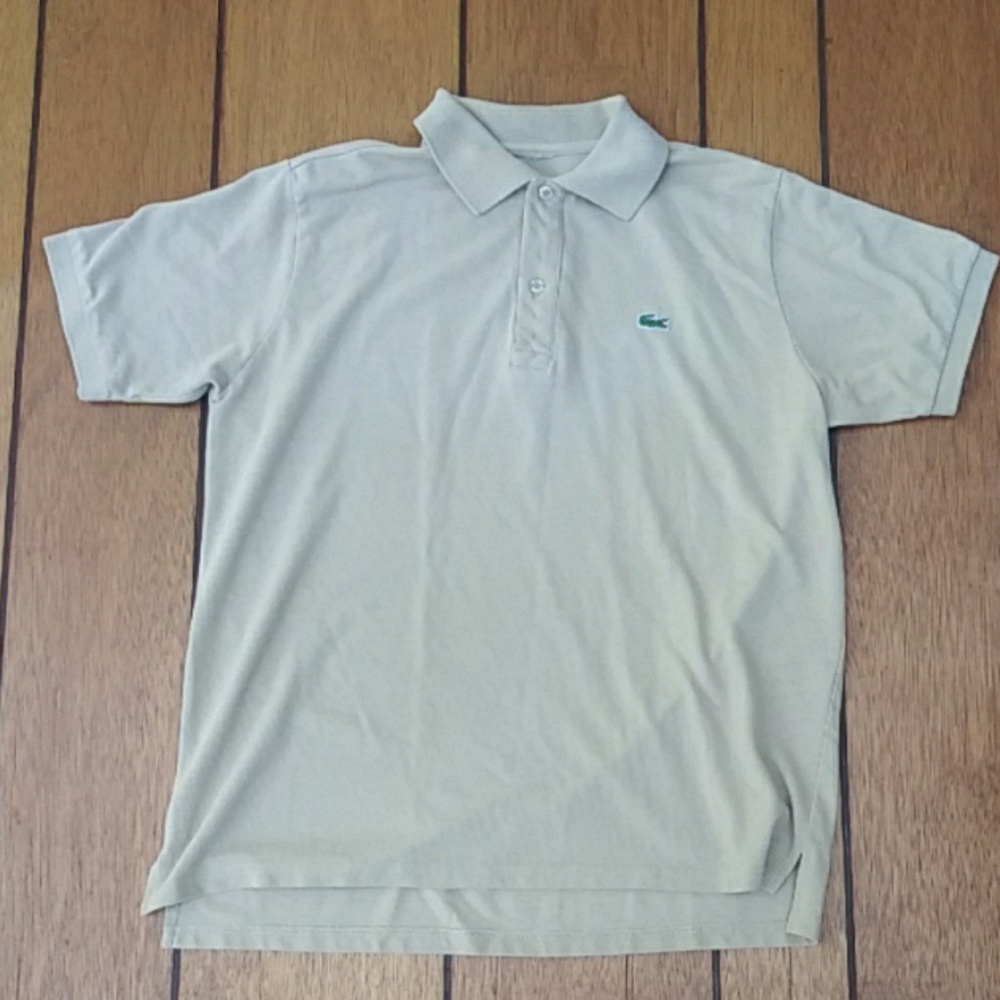 Lacoste men's polo, measures medium. no tags
